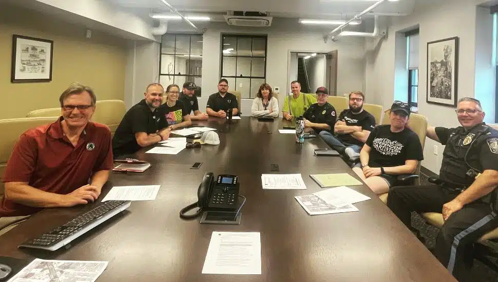 Several people sitting at a business meeting