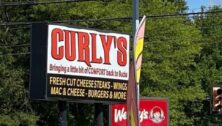 The sign for Curly's Comfort Food