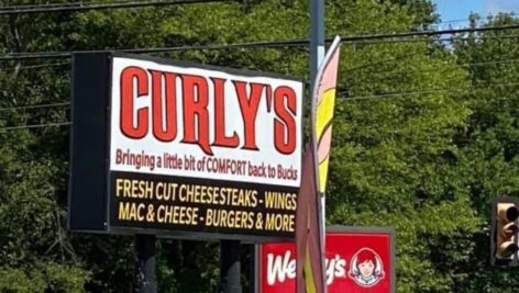The sign for Curly's Comfort Food
