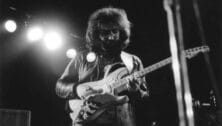 Grateful Dead frontman Jerry Garcia playing guitar