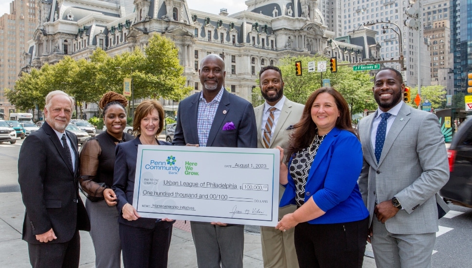 Penn Community Bank presents the Urban League of Philadelphia with donation.