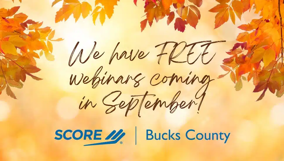 A sign advertising events by SCORE Bucks County.