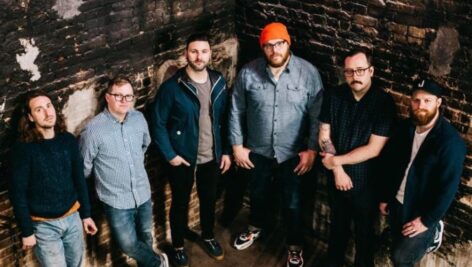 The six members of The Wonder Years standing next to each other