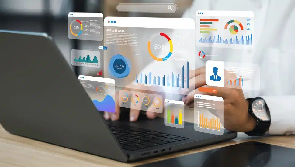 A computer with graphs and charts
