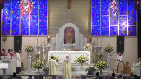 A mass inside of Our Lady of Good Counsel