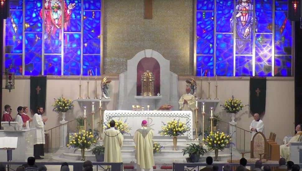 A mass inside of Our Lady of Good Counsel