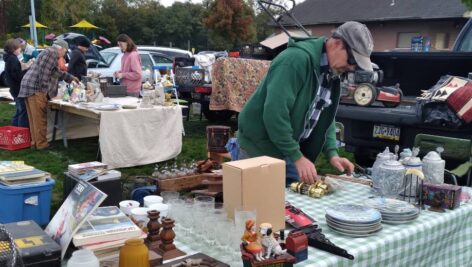 A vendor at the community yard sale