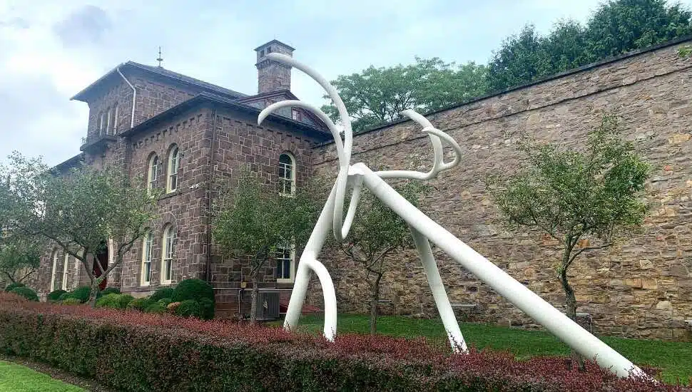 A statue outside of the Michener Art Museum