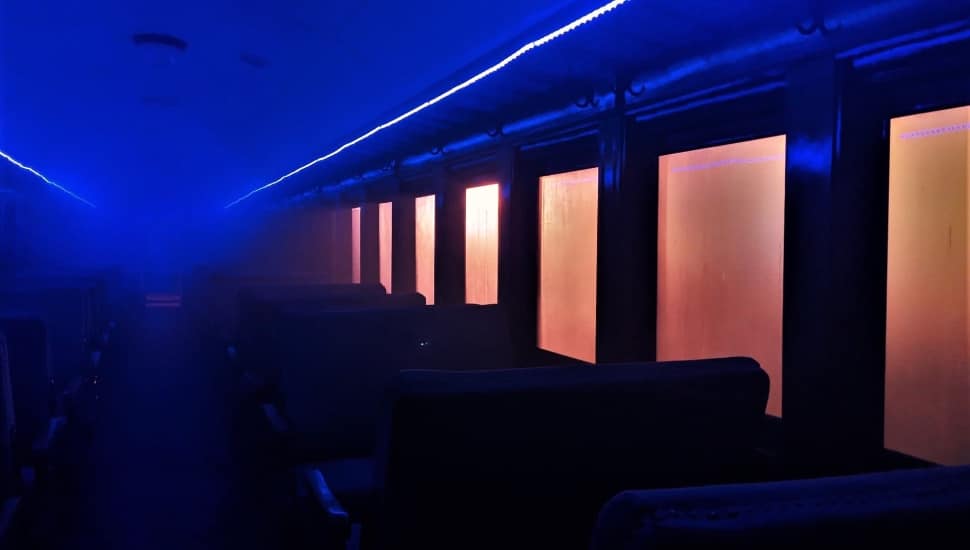 A train filled with fog and blue lights for Halloween
