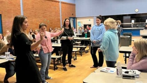 An exercise during a Penn State Abington Continuing Education workshop on teaching children with trauma is led by Gina Hernandez (left), executive director of ChildWIN and a licensed professional counselor.