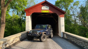 Bucks County jeep in covered bridge