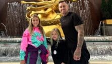 Doylestown native Pink's daughter, son and husband posing at Rockefeller Center