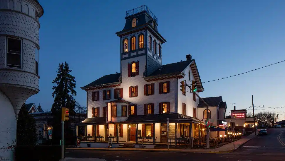 Exterior shot of Washington House Hotel in Sellersville at night, lights on