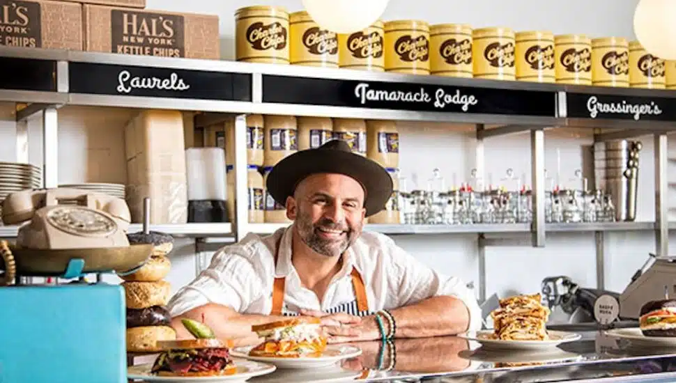 Nick Liberato behind counter at Borscht Belt Deli