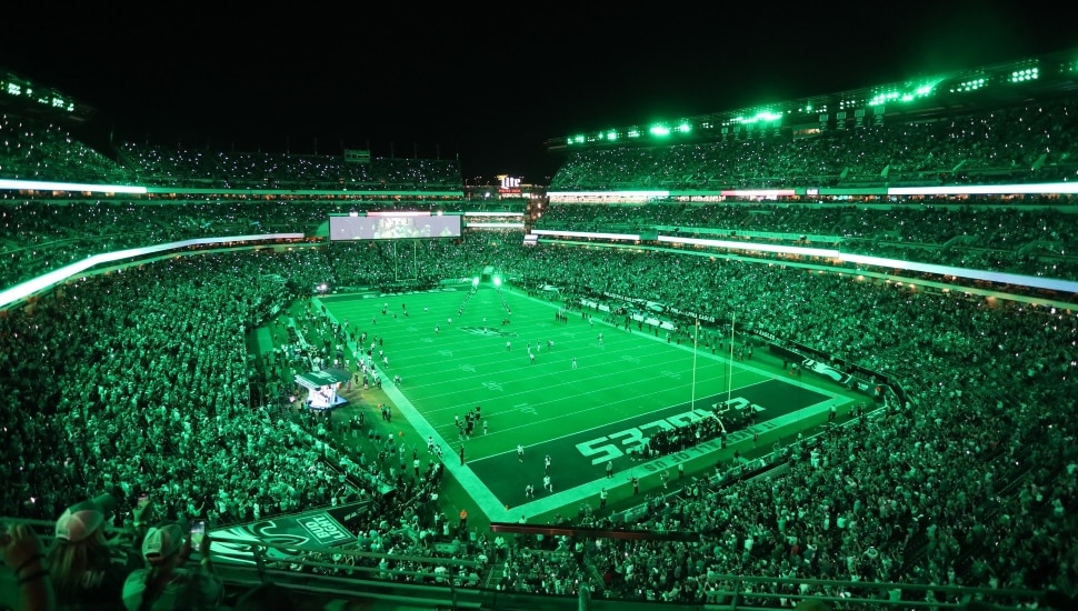 A wideshot of an Eagles game with thousands of fans