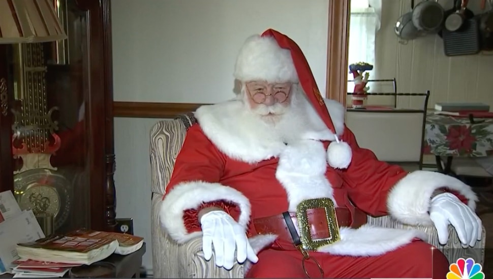 Trevose's Tom Roberts sitting down in santa suit