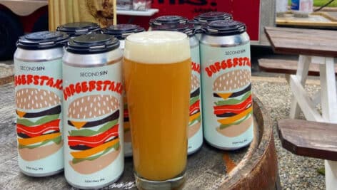 Burgerstaxx cans and beer in glass