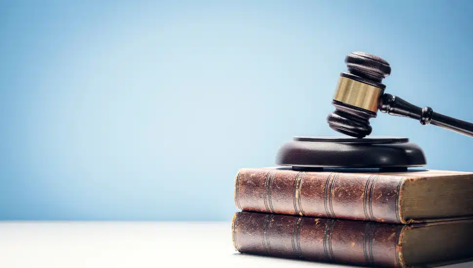 Judge gavel and law books in court, law and justice background concept with copy space