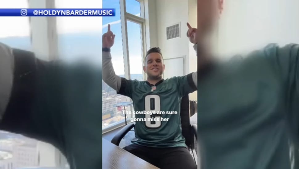 Holdyn Barder singing wearing Eagles Jersey