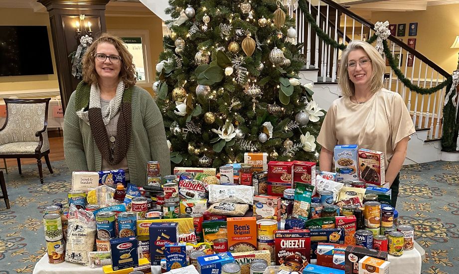 Shown are the donated items with Kim Ranck, Director of Community Life Services (left), and Shana Kelly, Community Life Services Coordinator (right).
