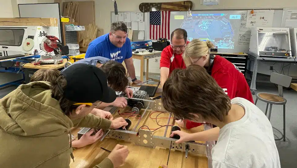 Robotics team building device in classroom