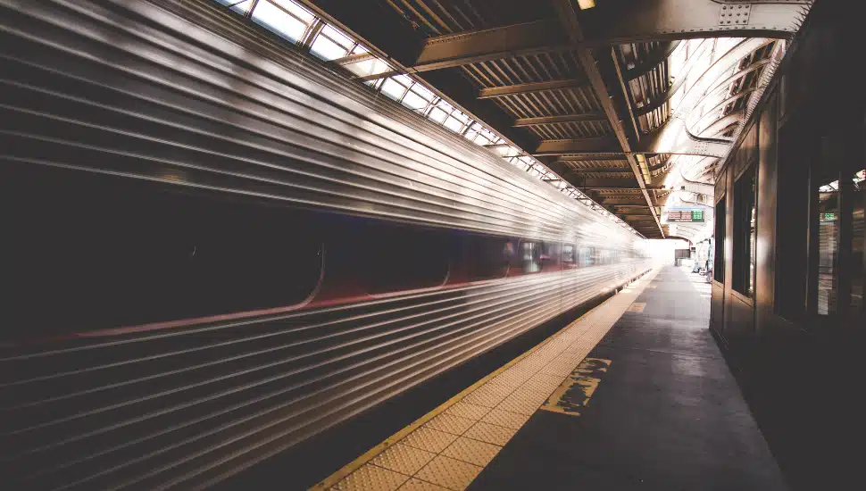 view of SEPTA train in motion from platform