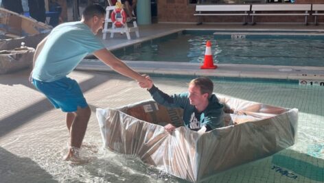 Penn State Abington engineering students demonstrate teamwork while competing in the Cardboard Regatta.
