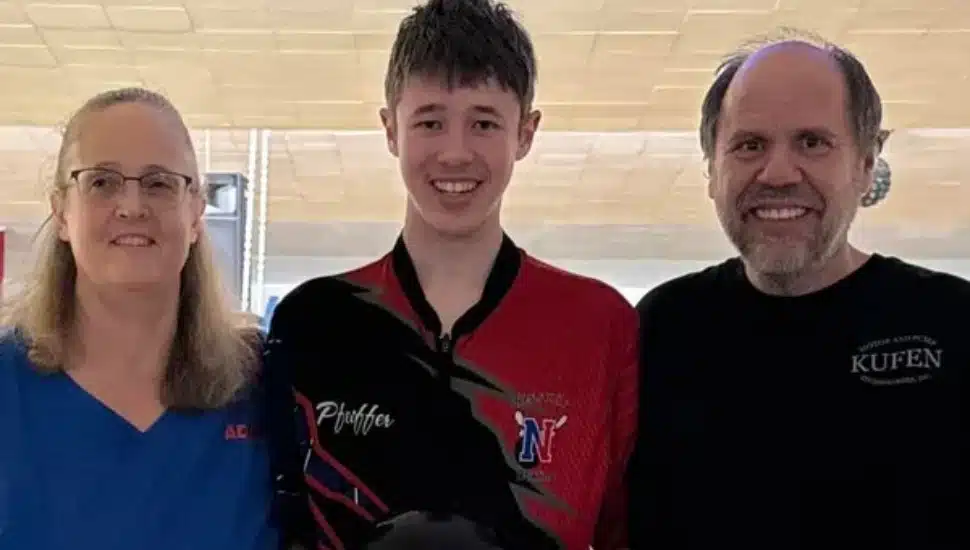 Zak Pfeiffer bowling with parents