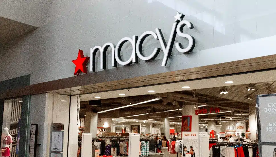 indoor entrance of macy's at a mall