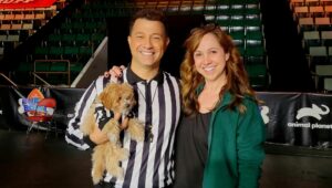 Puppy Bowl Referee Dan Schachner and Doylestown puppy trainer Victoria Schade.