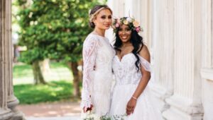 Vidalina (left) Rodriguez and Nzinga Gocking took portraits on the steps of the First Bank of the United States before their Location 215 wedding.