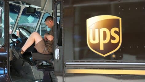 UPS Drive sits in his truck