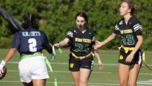 Girls playing flag football