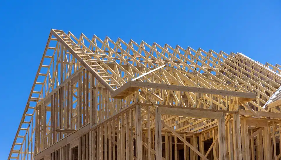 The wooden frame of a home under construction.