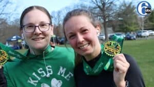 two women with medals at St. Patrick's Day event in Lahaska Peddler's Village