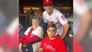 Bette Overmier and her two grandsons at a Phillies game