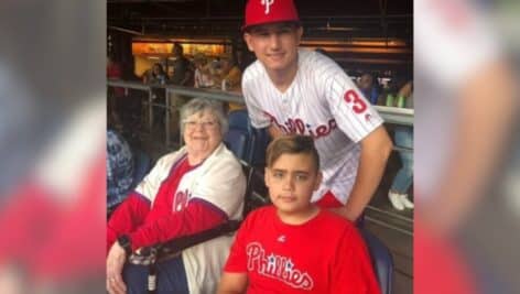 Bette Overmier and her two grandsons at a Phillies game