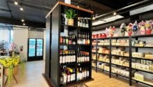 Inside of Mercatino Italian Market shelves of wine and snacks