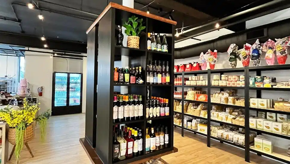 Inside of Mercatino Italian Market shelves of wine and snacks