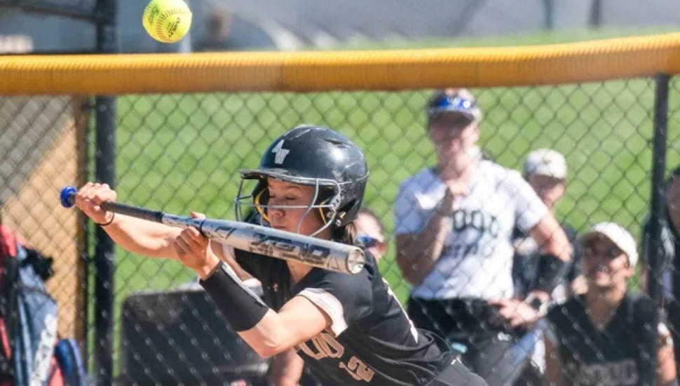 Maura Yoos playing softball