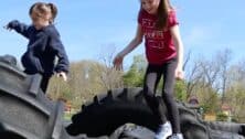 kids jumping on tires at Hellerick's Family Farm