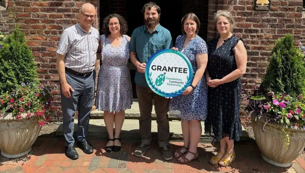 Members of the Heritage Conservancy team accepting a grant in front of historic Aldie Mansion in Doylestown. From left to right: President and CEO Bill Kunze, Development Director Katie Paone-Kulp, Grants Manager Joe Ganguzza, Community Engagement Programs Manager Shannon Fredebaugh-Siller, and Vice President Kris Kern.