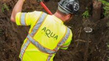 Aqua Pennsylvania worker digging.