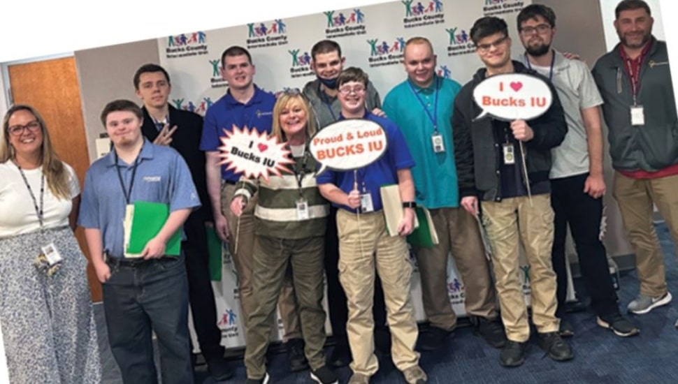 Bucks County Expo event attendees holding signgs in group photo