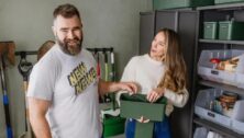 Jason and Kylie have a moment while organizing the clutter in their Haverford garage.