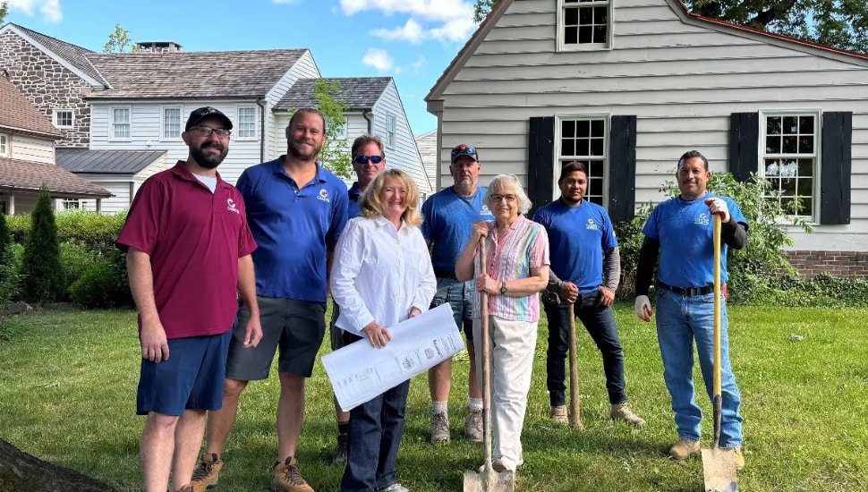 Newtown Borough Councilo Julia Woldorf and landscape designer Nancy Minich with the Gaspar Landscaping Team at the groundbreaking for Patriots Park outside