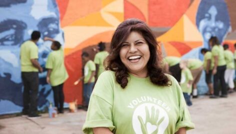 Female senior citizen volunteering.