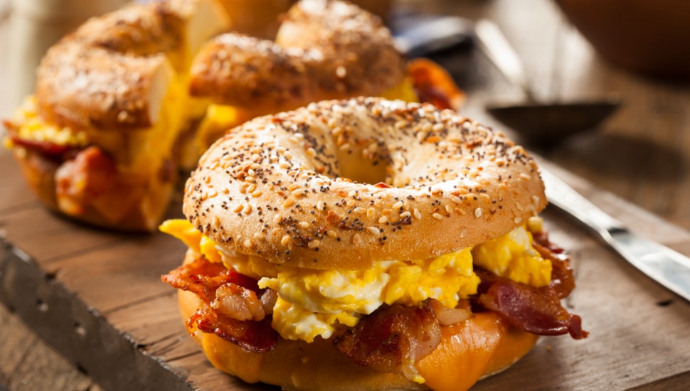 A hearty breakfast sandwich on a bagel.