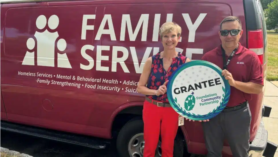 Family Service Association of Bucks County CEO Julie Dees and Grants and Communications Manager Brian Treanor accept a Capital Improvement Grant on behalf of the Bucks County-based nonprofit.