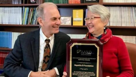 Dr. Tim Blok and wife Joan with Hepatitis B Foundation award